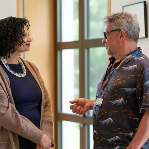 Dr Tara Inniss talking to Prof. David Pyle at CaribOx showcase