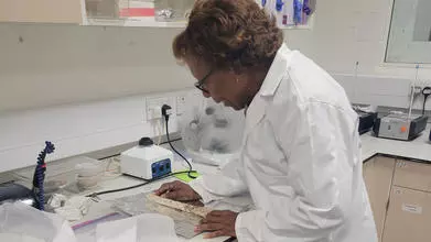 Grace Turner working in a lab